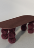 World’s Fluffiest Sphere Table – sculptural upholstered sphere table in custom finish

Close-up of hairy legs on World’s Fluffiest Sphere Table, handcrafted in NSW