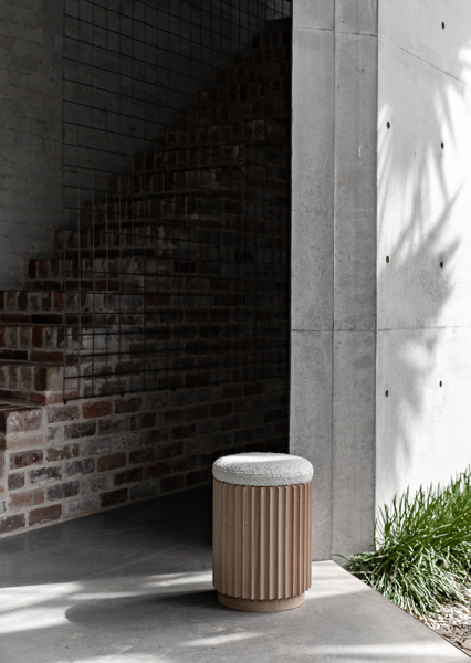 Underline Stool – sculptural side table in American Oak with boucle top