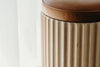 Underline Stool – sculptural side table in American Oak with leather top